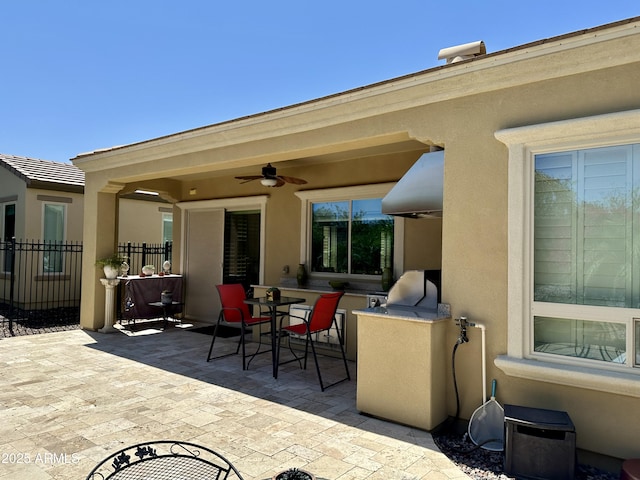 562 E Vesper Trl, Queen Creek, AZ 85140 - view of patio / terrace with a ceiling fan and an outdoor kitchen