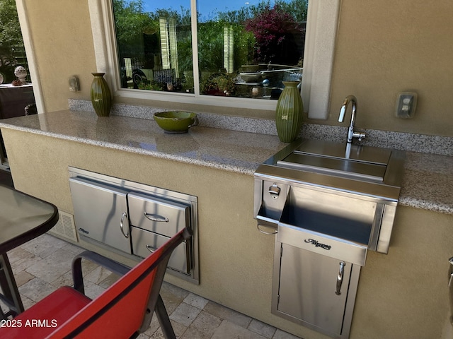 562 E Vesper Trl, Queen Creek, AZ 85140 - kitchen featuring stone tile floors