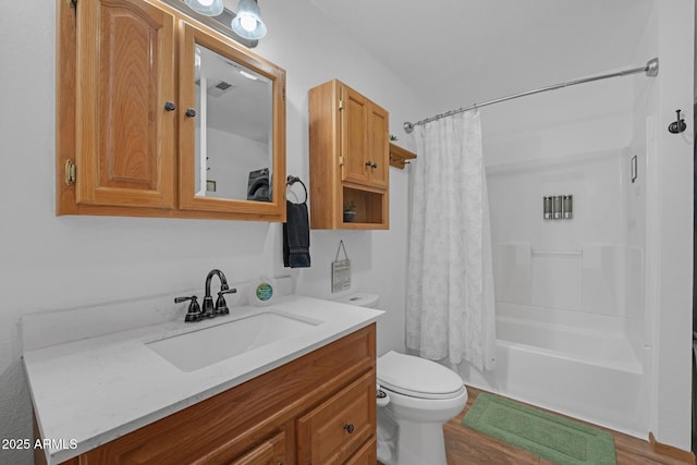 full bathroom with shower / bath combination with curtain, toilet, and vanity