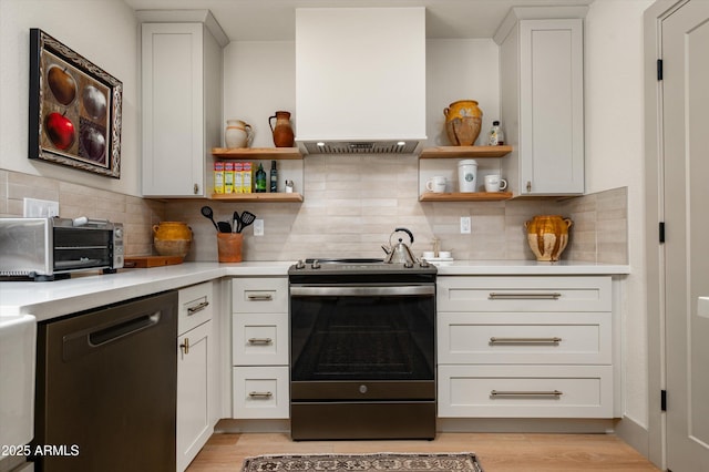 8068 E Del Trigo Rd, Scottsdale, AZ 85258 - kitchen with stainless steel electric range, open shelves, light countertops, and dishwasher