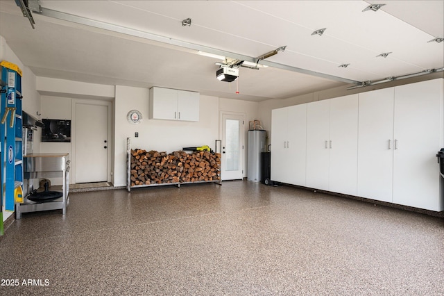 8068 E Del Trigo Rd, Scottsdale, AZ 85258 - garage with a garage door opener and water heater