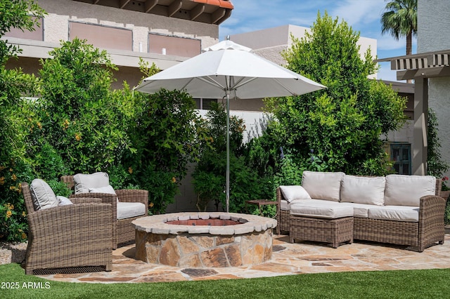 8068 E Del Trigo Rd, Scottsdale, AZ 85258 - view of patio / terrace with an outdoor living space with a fire pit
