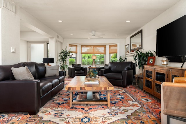8068 E Del Trigo Rd, Scottsdale, AZ 85258 - living room with ceiling fan and recessed lighting