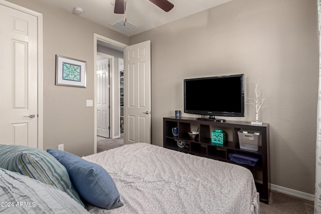 bedroom with ceiling fan and carpet floors