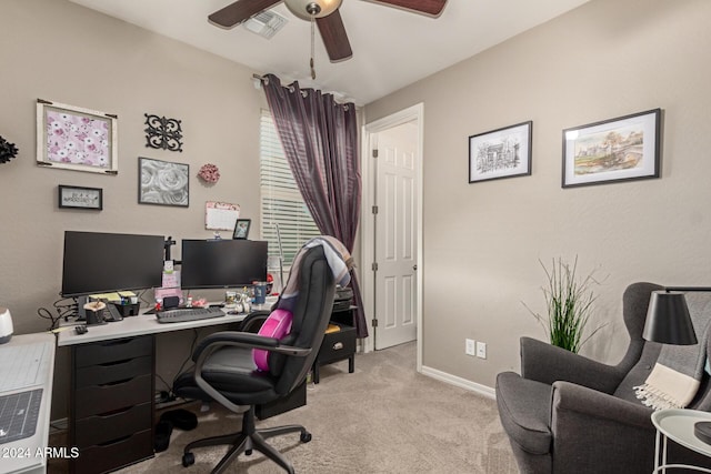 carpeted office with ceiling fan