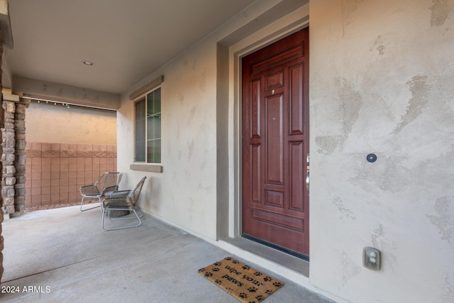 doorway to property with a porch