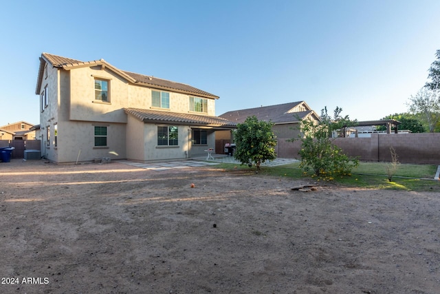 back of house featuring a patio and central AC