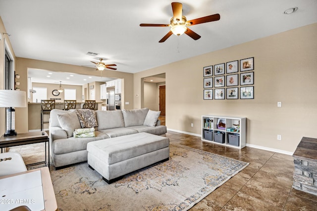 living room with ceiling fan