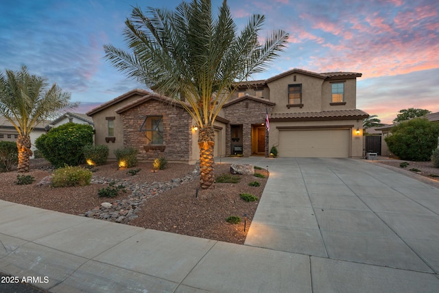 view of front of property with a garage