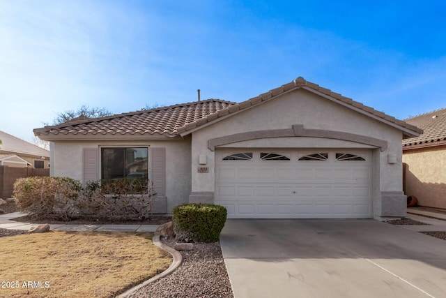 view of front of home with a garage