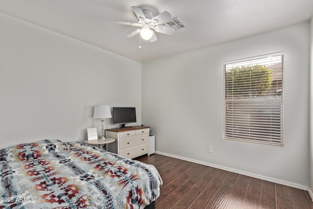 bedroom featuring ceiling fan and dark hardwood / wood-style flooring