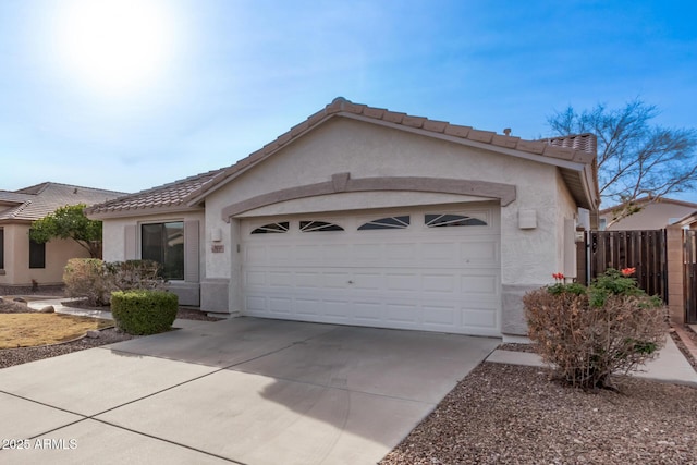 ranch-style home featuring a garage