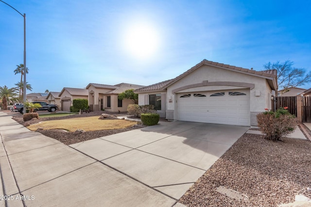 ranch-style home featuring a garage