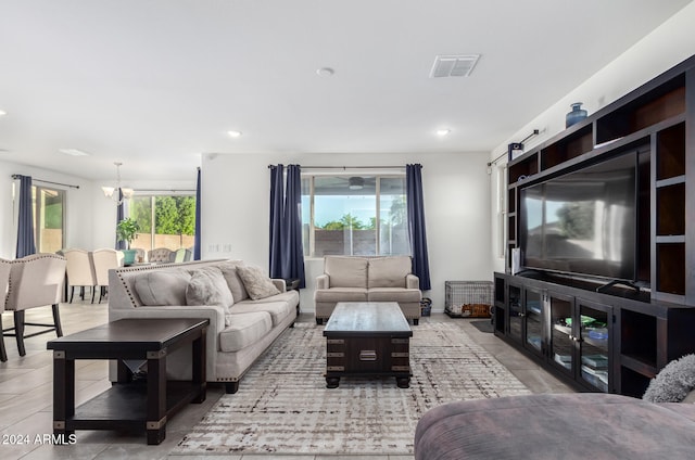 living room with light tile patterned flooring