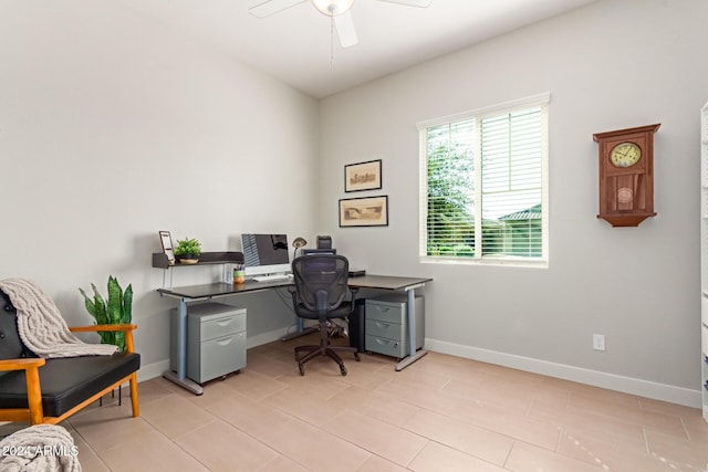 tiled office featuring ceiling fan