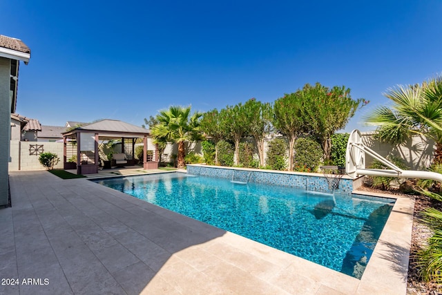 view of swimming pool with a gazebo, pool water feature, and a patio