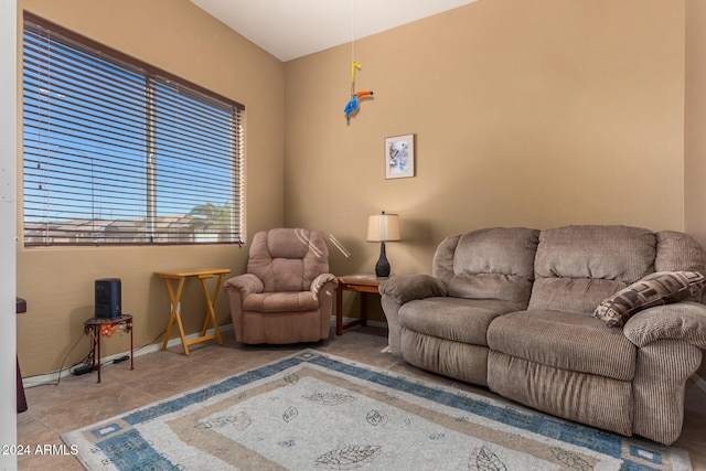 living room with tile patterned floors