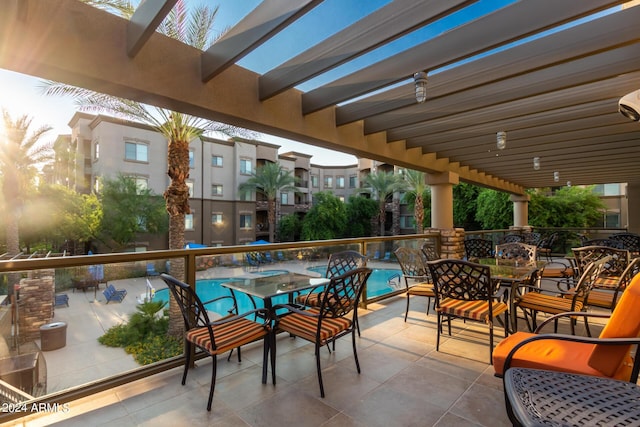 view of patio / terrace with outdoor dining area and a pergola