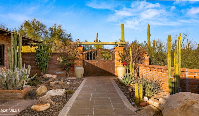 exterior space featuring a gate and fence