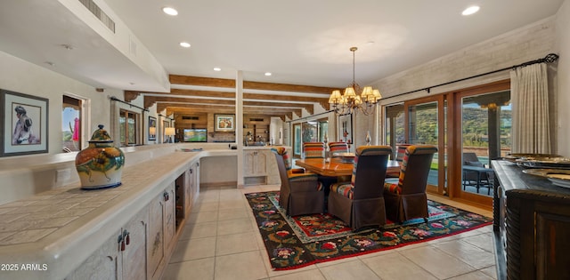 dining space with a chandelier, light tile patterned floors, visible vents, and recessed lighting