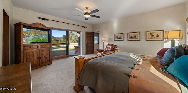 bedroom with access to outside, a ceiling fan, and light colored carpet