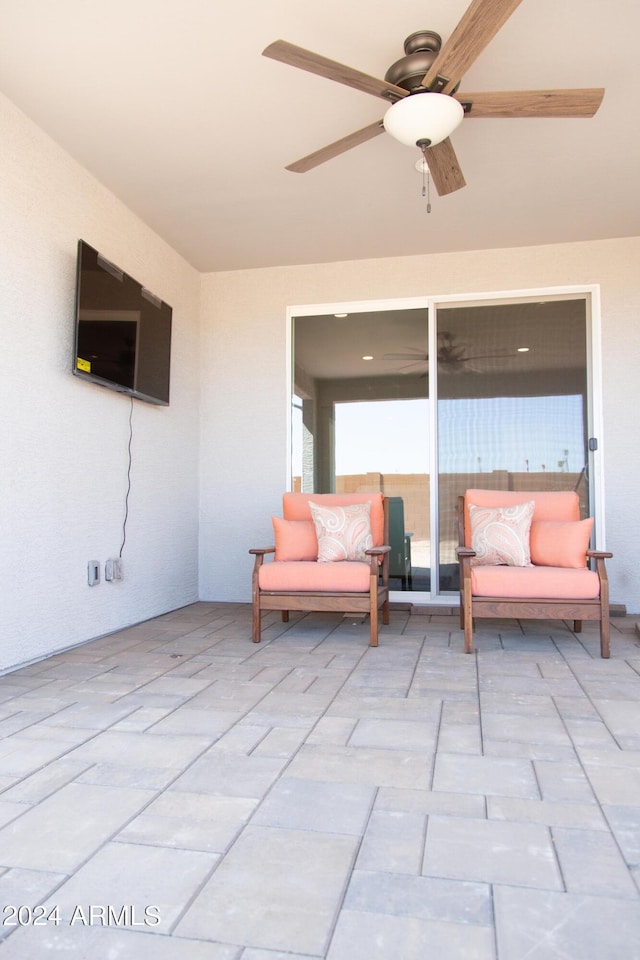 view of patio / terrace featuring ceiling fan