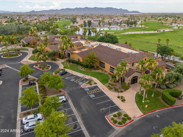 bird's eye view with a residential view, a mountain view, and golf course view