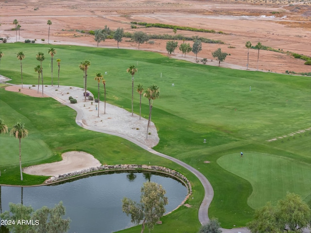 view of property's community featuring a water view and golf course view