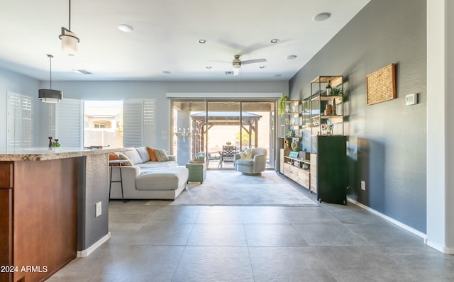 living room featuring ceiling fan