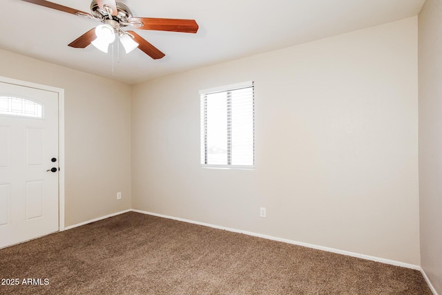 2227 N 57th Dr, Phoenix, AZ 85035 - spare room featuring carpet, ceiling fan, and baseboards