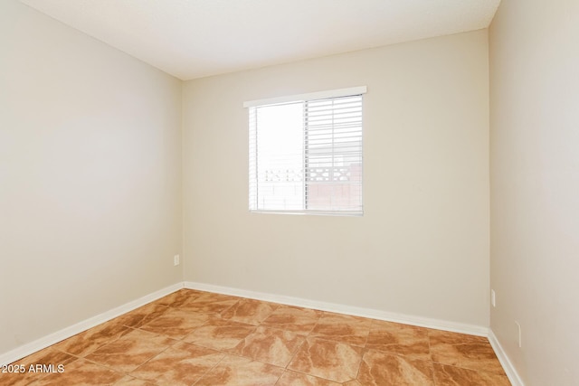 2227 N 57th Dr, Phoenix, AZ 85035 - empty room with baseboards