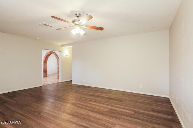 2227 N 57th Dr, Phoenix, AZ 85035 - empty room featuring wood finished floors, ceiling fan, and baseboards