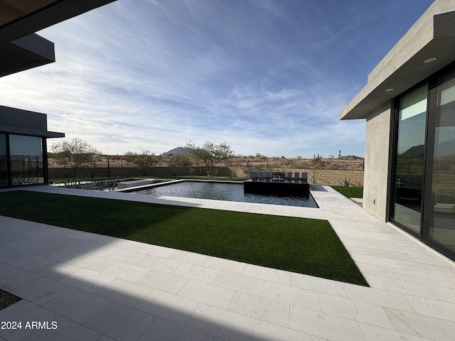 view of yard with a patio area