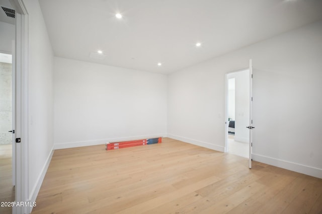 empty room featuring light hardwood / wood-style floors