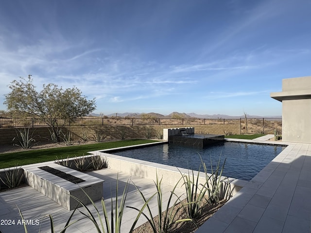 view of pool featuring a mountain view