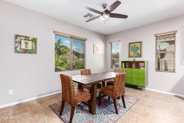 dining room with ceiling fan