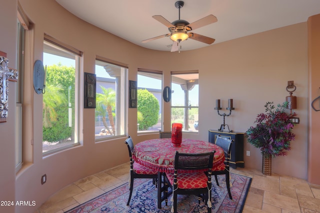 dining area featuring ceiling fan and a healthy amount of sunlight