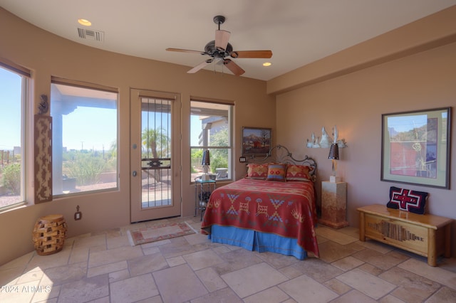 bedroom with access to outside and ceiling fan