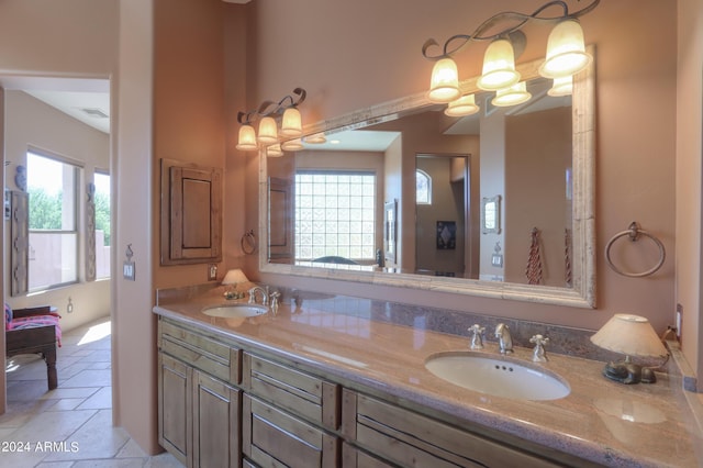 bathroom featuring vanity and plenty of natural light