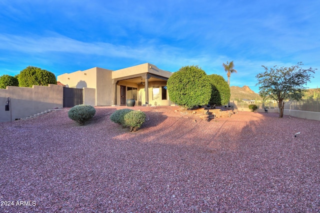 view of pueblo revival-style home