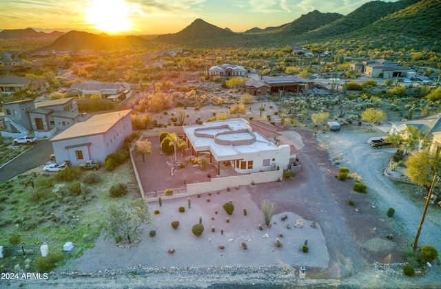 aerial view at dusk with a mountain view