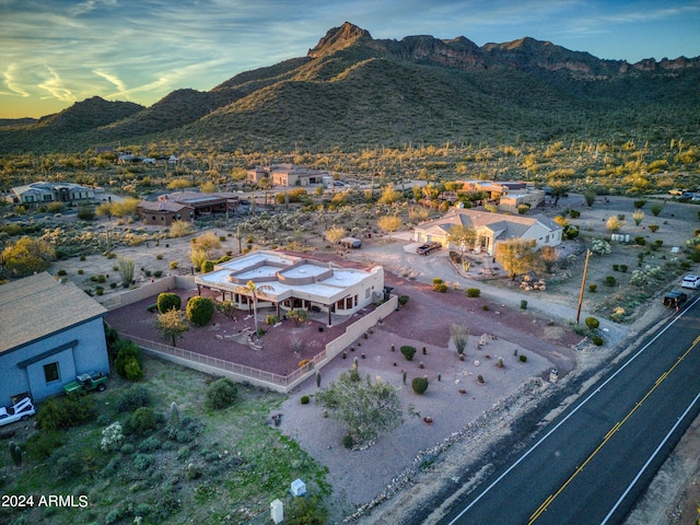 aerial view at dusk with a mountain view