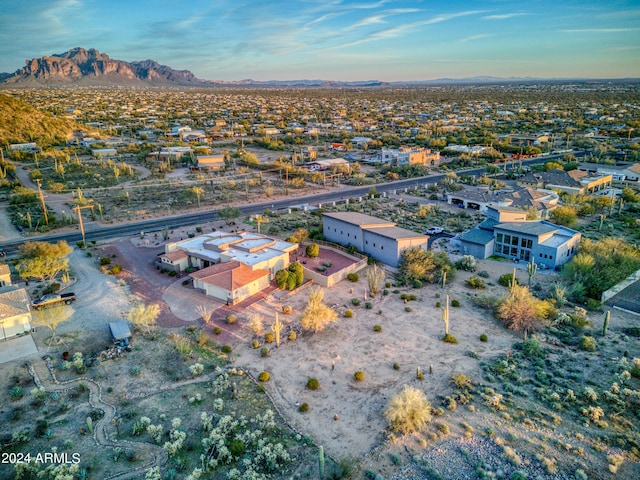 drone / aerial view featuring a mountain view