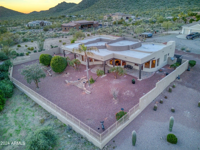 view of aerial view at dusk