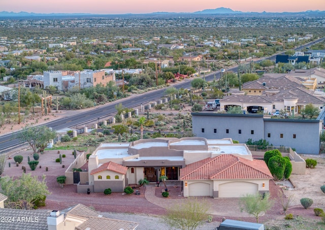 view of aerial view at dusk