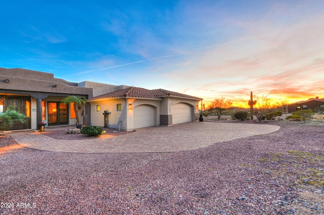 view of front of property featuring a garage