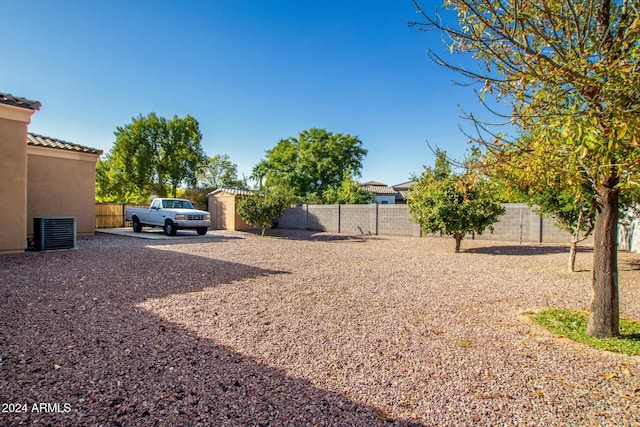 view of yard featuring central AC