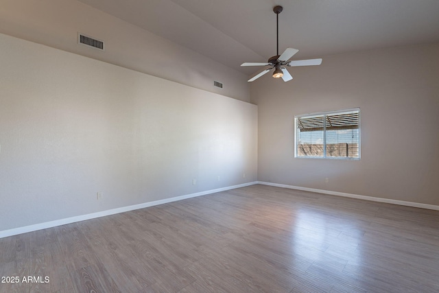 spare room with high vaulted ceiling, ceiling fan, and light hardwood / wood-style flooring