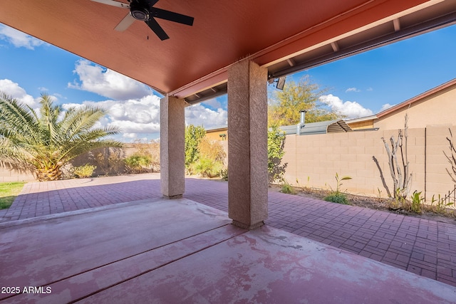 view of patio / terrace featuring ceiling fan