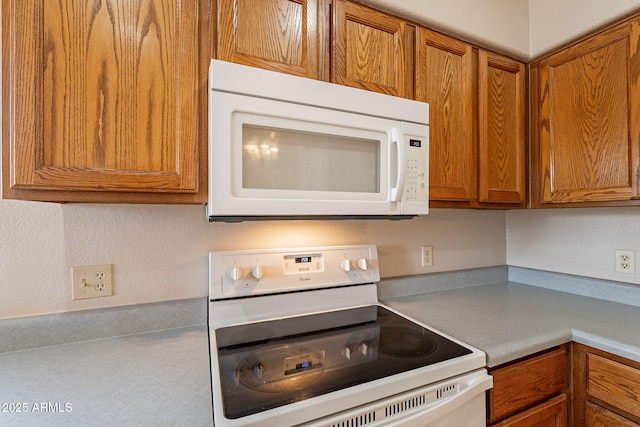 kitchen featuring white appliances